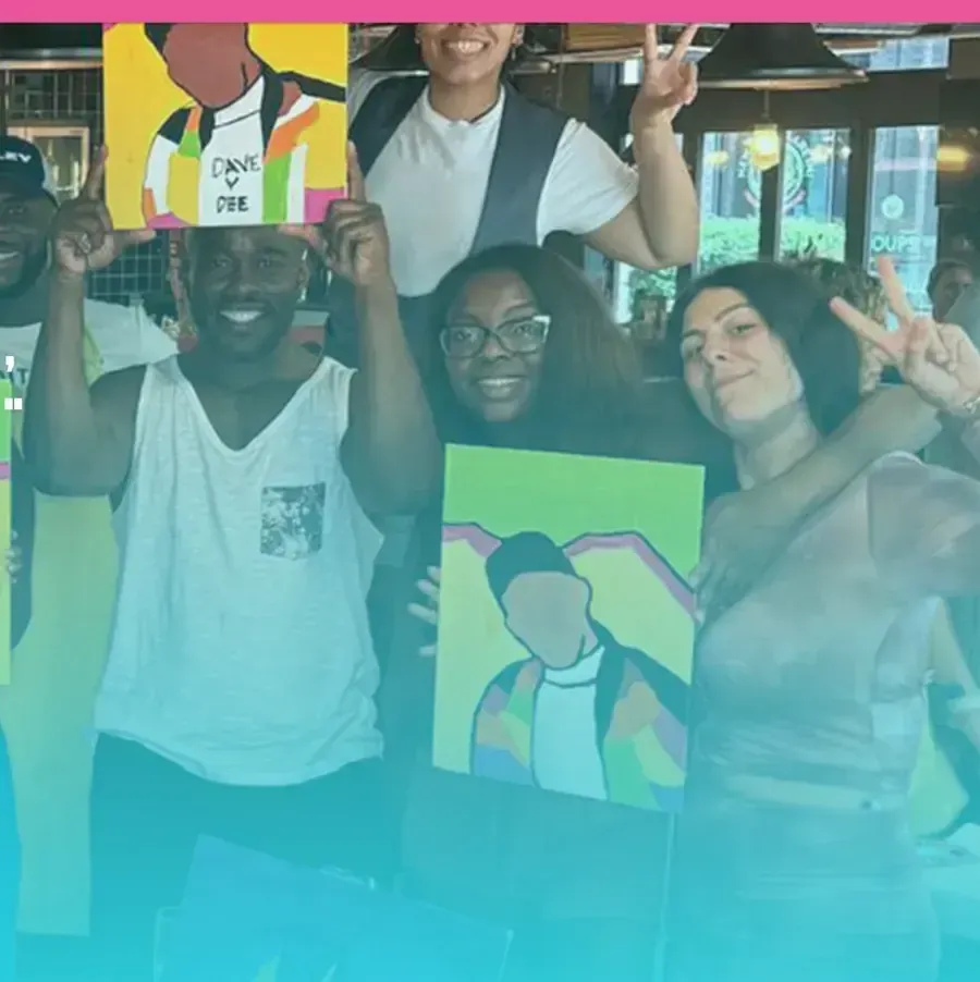 DWTN guests holding up their completed paintings after a sip and paint night in London